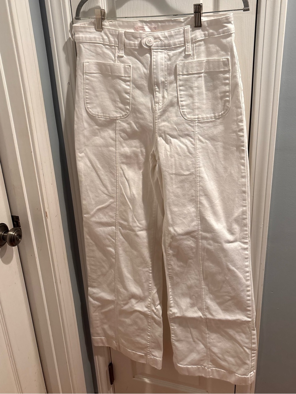 LC Lauren Conrad White Flare Pants with Button Detail
